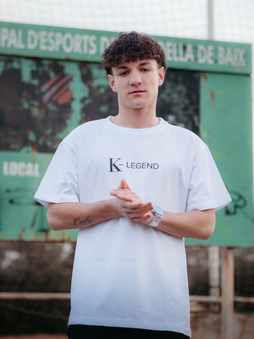 Oversized white t-shirt from K-Legend Collection, featuring a relaxed fit and soft fabric texture.